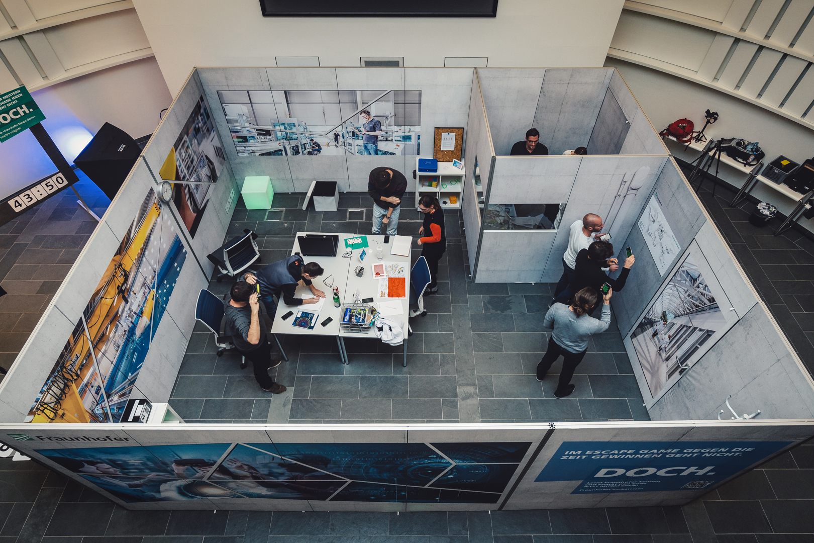 In our lecture hall a 5x6m large cube was built and converted into an office of a Fraunhofer scientist.